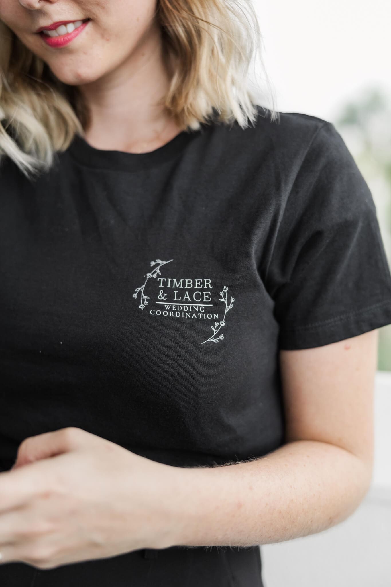 Logo on a shirt belonging to a Rockhampton wedding planner, Timber and Lace Coordination.