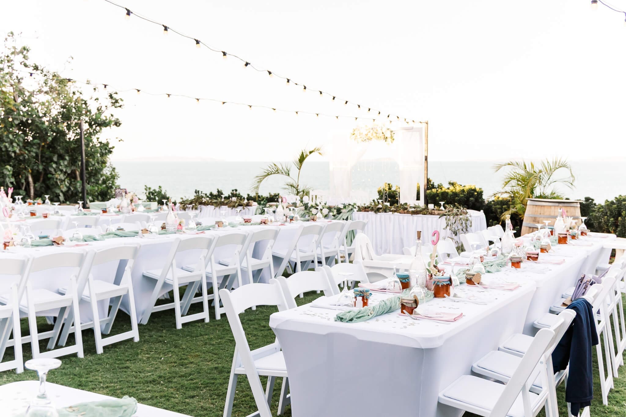 Wedding reception area set up outdoors at The Haven Yeppoon, a beautiful coastal venue.